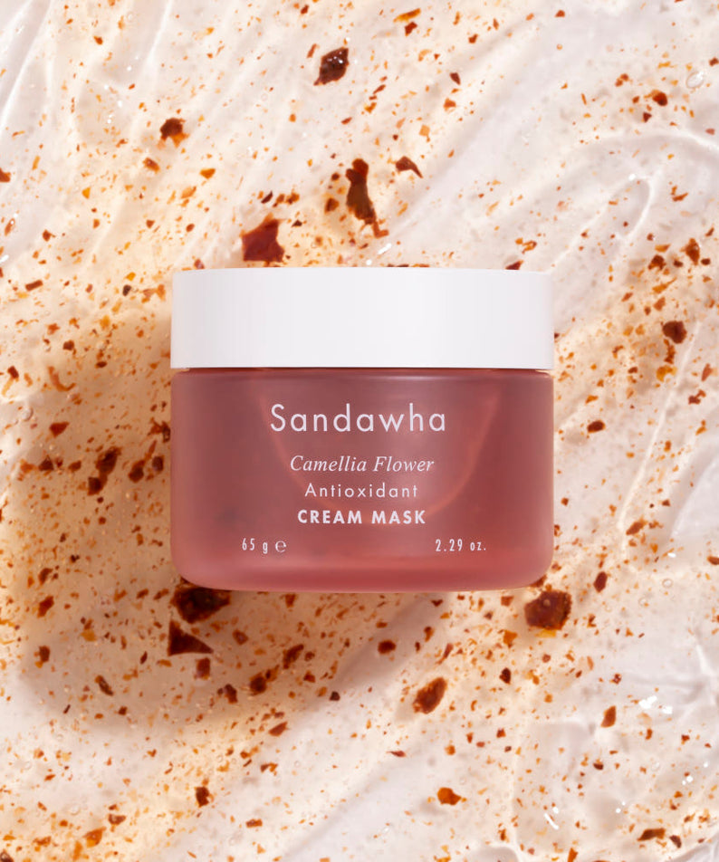 SANDAWHA Camellia Flower Cream Mask 65g de Sandawha, pot sur fond crème camélia avec particules, photo produit