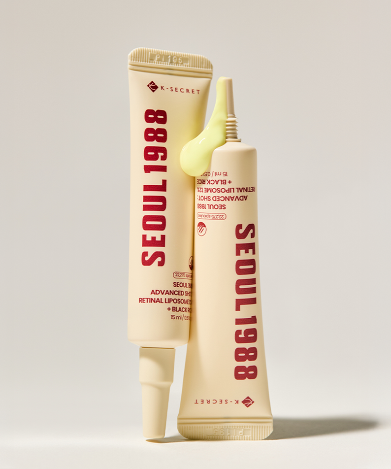SEOUL 1988  Advanced Retin-R Shot 15ml de K-Secret, tube crème jaune sur fond clair, style produit beauté.