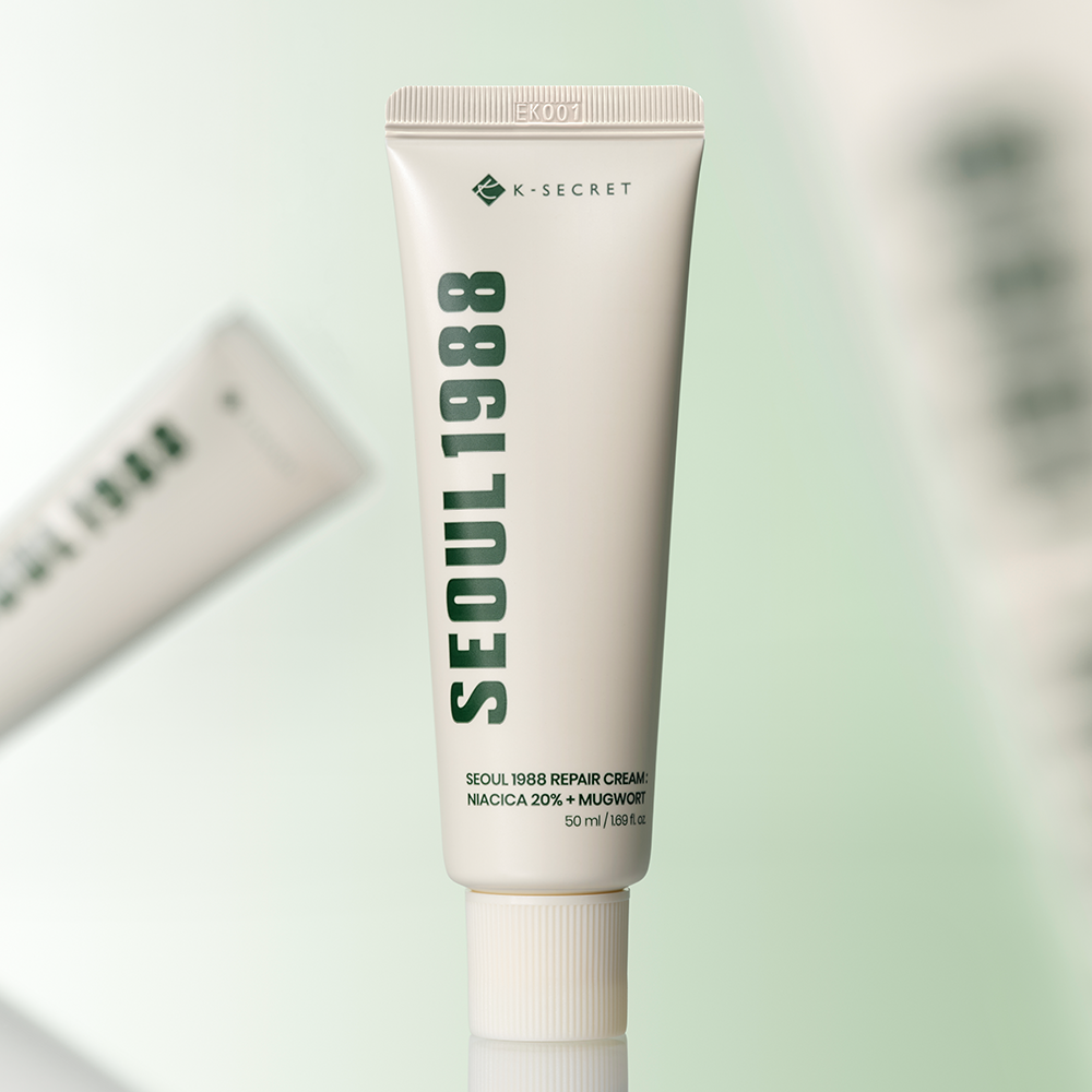 SEOUL 1988  Niacica Repair Cream 50ml : tube crème K-SECRET sur fond clair, vue produit en studio.