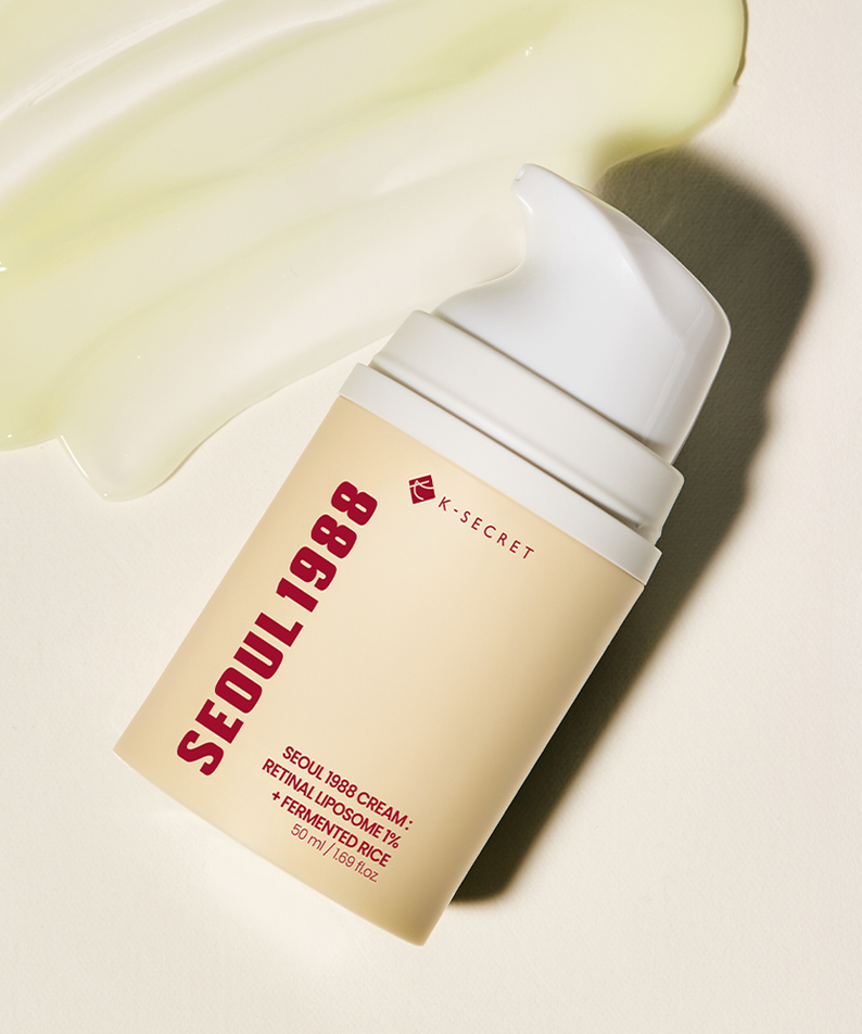 SEOUL 1988 Retinal Fermented Rice Cream 50ml, marque K-SECRET, crème jaune sur fond blanc, flacon et texture visible