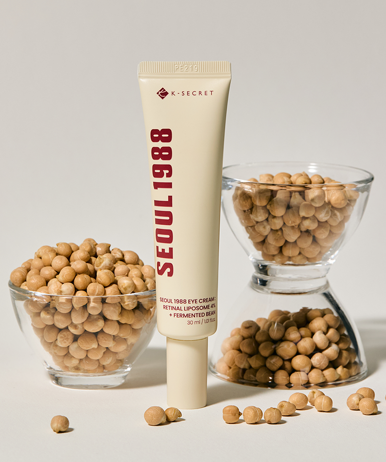 SEOUL 1988 Retinal Fermented Soybean Eye Cream 30ml K-Secret, tube beige sur fond clair avec soja fermenté et graines.