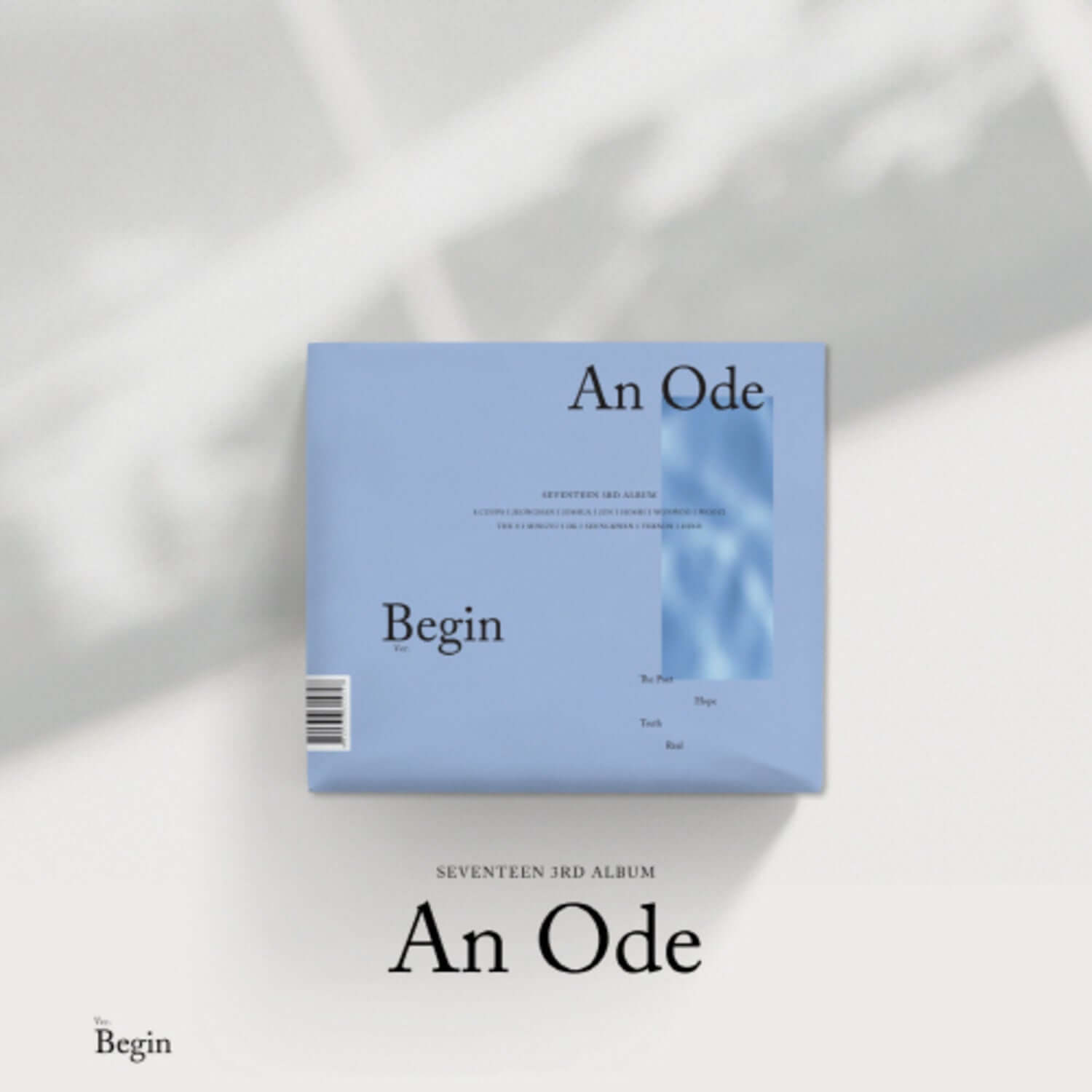 SEVENTEEN - [An Ode] 3rd Album (Begin Ver.) - Album Kpop, pochette bleue sur fond clair, look studio.