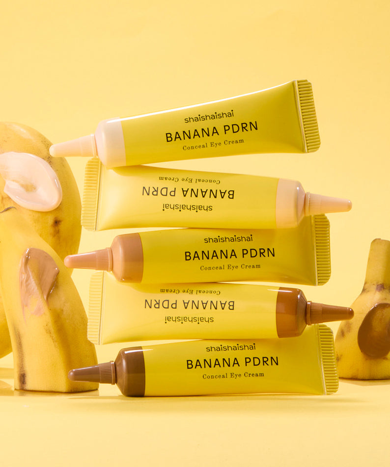SHAISHAISHAI Banana PDRN Conceal Eye Cream 15ml, tubes sur fond jaune, ambiance beauté avec bananes