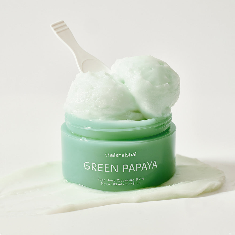 SHAISHAISHAI Green Papaya Pore Deep Cleansing Balm 85ml, pot vert et spatule sur fond clair, marque visible.