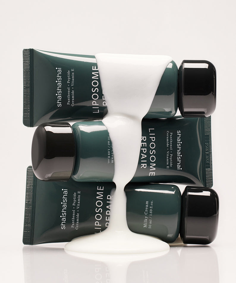 SHAISHAISHAI Liposome Repair Milky Cream 50ml, flacons verts et crème blanche sur fond clair, visuel produit marque