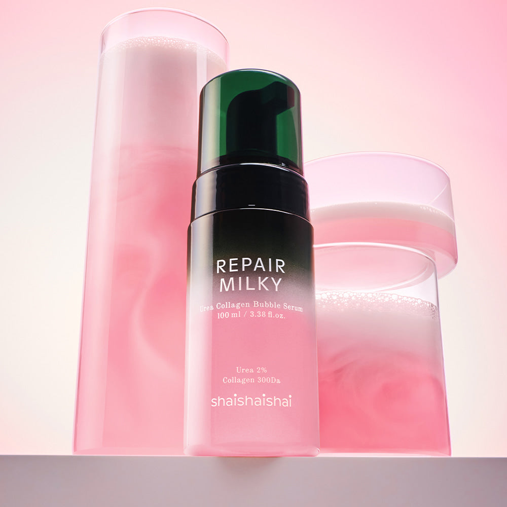 SHAISHAISHAI Repair Milky Urea Glow Bubble Serum 100ml : flacon rose sur fond pastel, contexte cosmétique visuel.