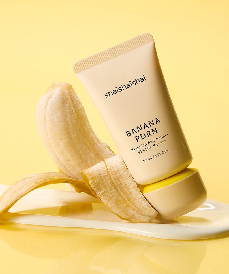 SHAISHAISHAI Banana PDRN Tone-Up Sun Primer 35ml sur fond jaune, avec bananes en contexte beauté.