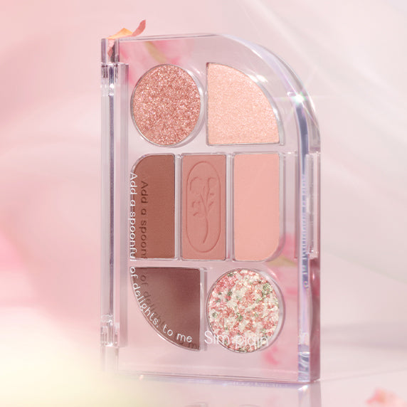 SIM;PLAIN Eye Palette de la marque SIM;PLAIN, palette maquillage yeux en verre, tons rose nacré sur fond clair.