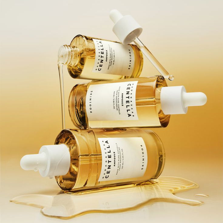 SKIN1004 Madagascar Centella Ampoule 100ml : flacons transparents sur fond beige, marque SKIN1004, contexte visuel soin visage