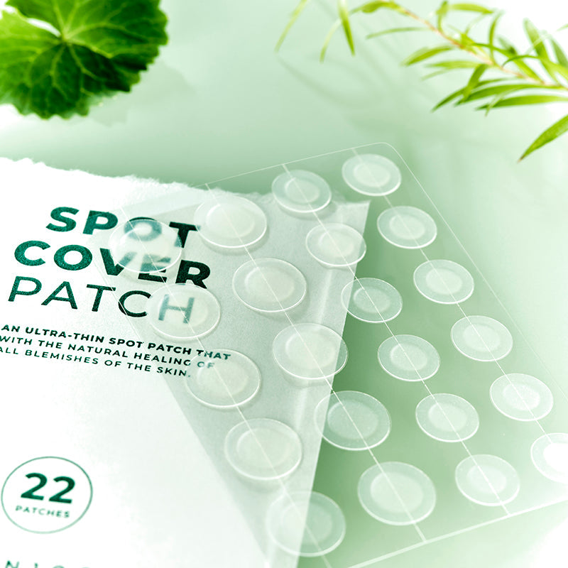 SKIN1004 Spot Cover Patch 22patch, marque SKIN1004, patchs transparents sur fond vert avec feuilles et gouttes