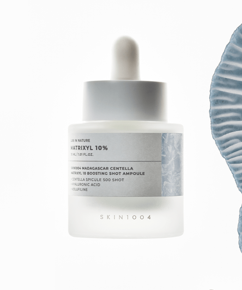 Image du produit SKIN1004 Madagascar Centella Matrixyl 10 Boosting Shot Ampoule 30ml avec ampoule et design élégant.