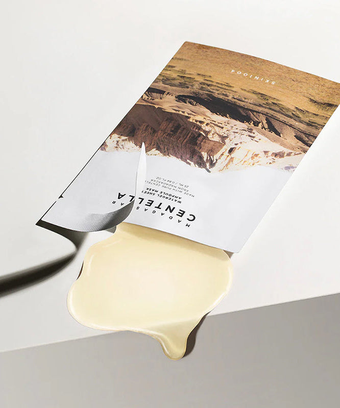 SKIN1004 Madagascar Centella Water Gel Sheet Ampoule Mask 25ml [5 sheets] sur une surface, montrant l'emballage distinctif.