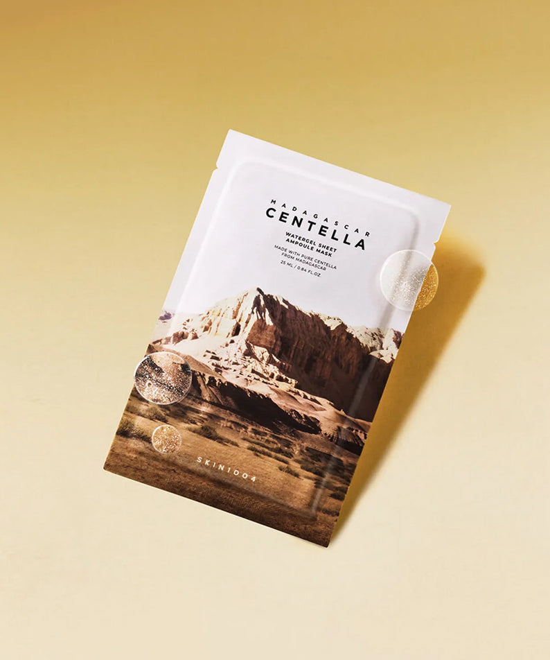 Photo du masque SKIN1004 Madagascar Centella Water Gel Sheet Ampoule Mask 25ml [5 sheets] sur fond doré.