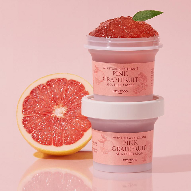 SKINFOOD Pink Grapefruit Aha Food Mask 120g de SKINFOOD sur fond rose, avec pamplemousse et texture gelée.