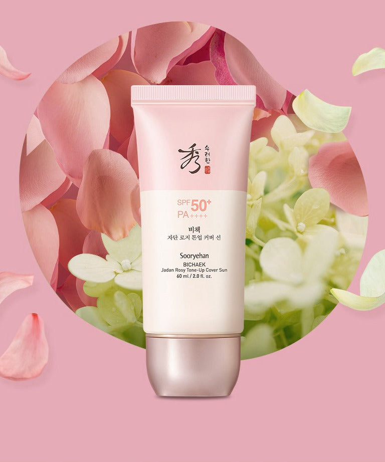 SOORYEHAN Bichaekjadan Rosy Tone-up Cover Sun 60ml, tube crème SPF50 sur fond rose avec pétales et fleurs, marque SOORYEHAN