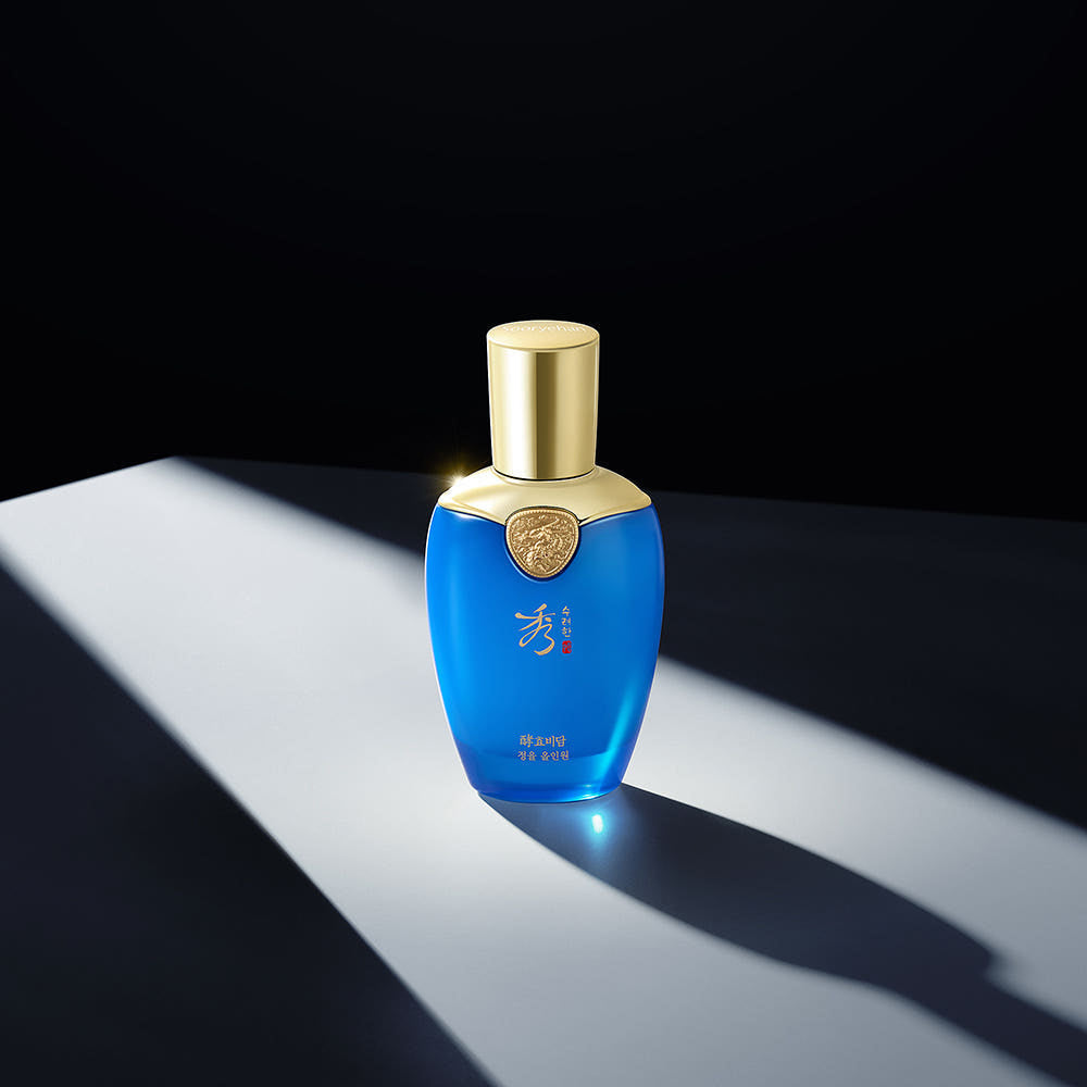 SOORYEHAN Hyobidam Jeongyul All-in-One 100ml de SOORYEHAN, flacon bleu sur fond noir avec lumière dorée