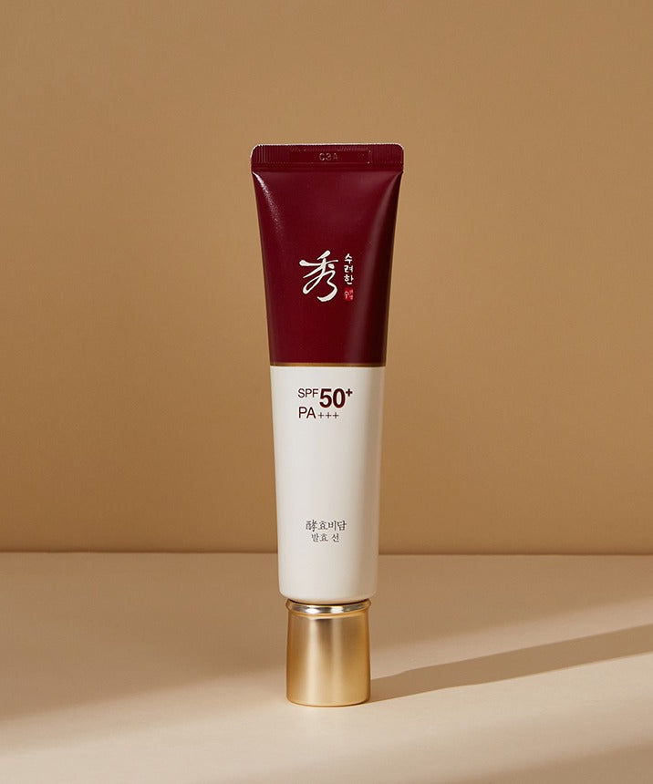 Tube de SOORYEHAN Hyobidam Fermented Sunscreen 60ml avec SPF50+ sur fond beige.