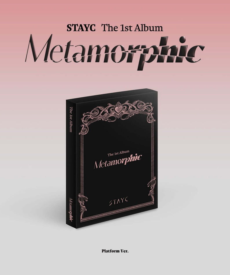 STAYC - 1st Album [Metamorphic] (Platform Ver.) - Album Kpop sur fond rose, couverture noire, STAYC en évidence.
