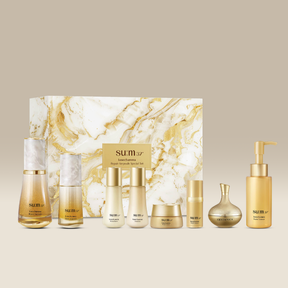 SU:M37 LosecSumma Repair Ampoule Planning (Set) par SU:M37, flacons et coffret sur fond marbre beige, visuel produit.