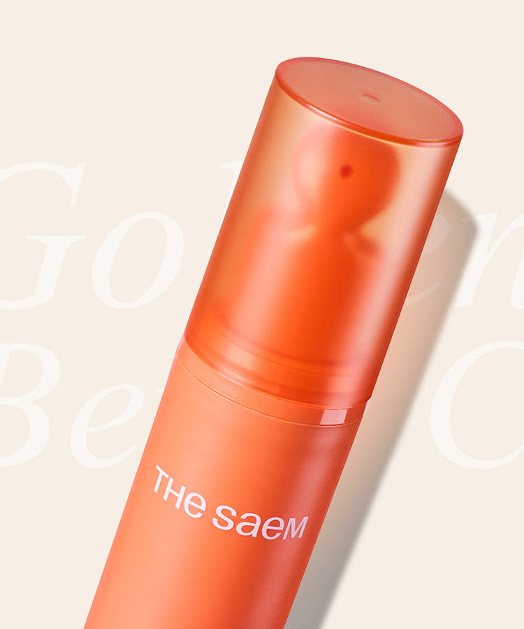 THE SAEM Golden Berry C Blemish Cream 30ml, tube orange THE SAEM sur fond beige, crème anti-impuretés en gros plan