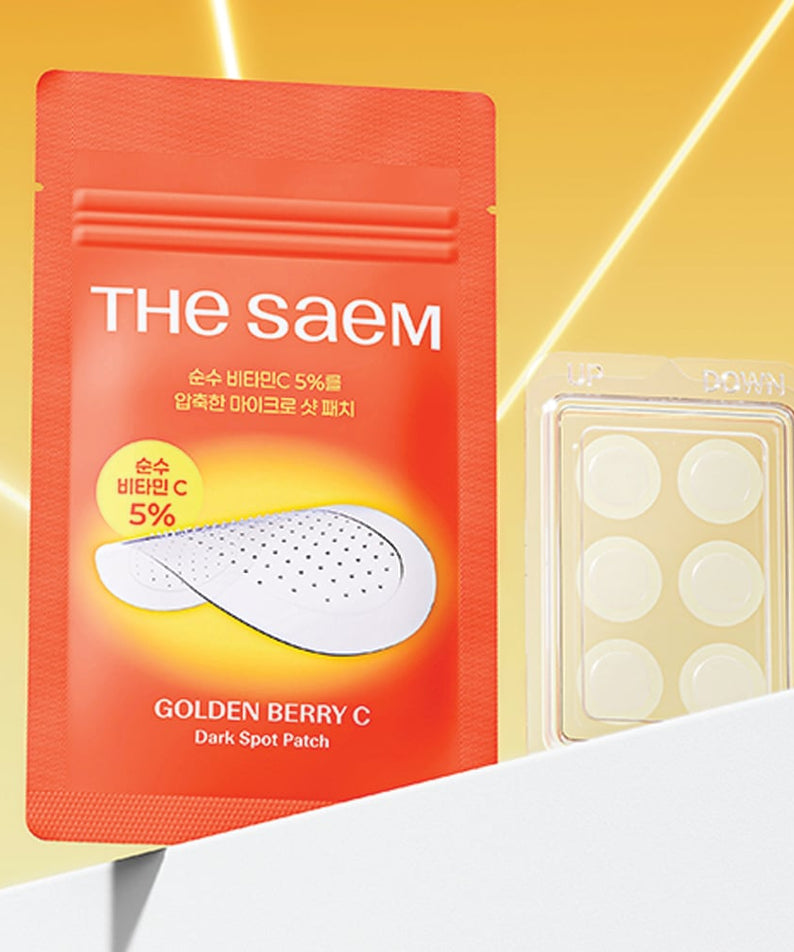 THE SAEM Golden Berry C Dark Spot Patch, marque coréenne, patch anti taches présenté sur fond jaune lumineux
