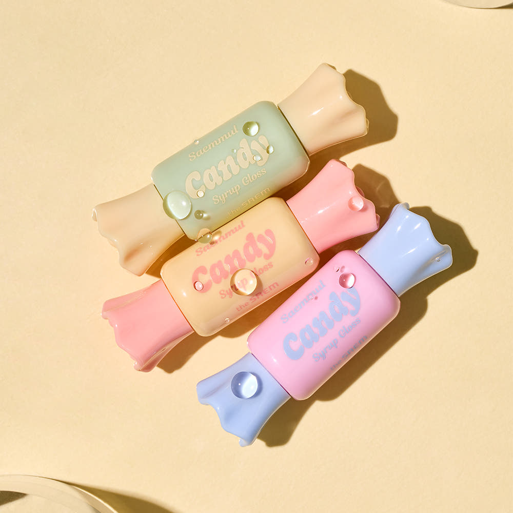 THE SAEM Saemmul Candy Syrup Gloss de la marque THE SAEM, tubes pastel sur fond crème en photo produit
