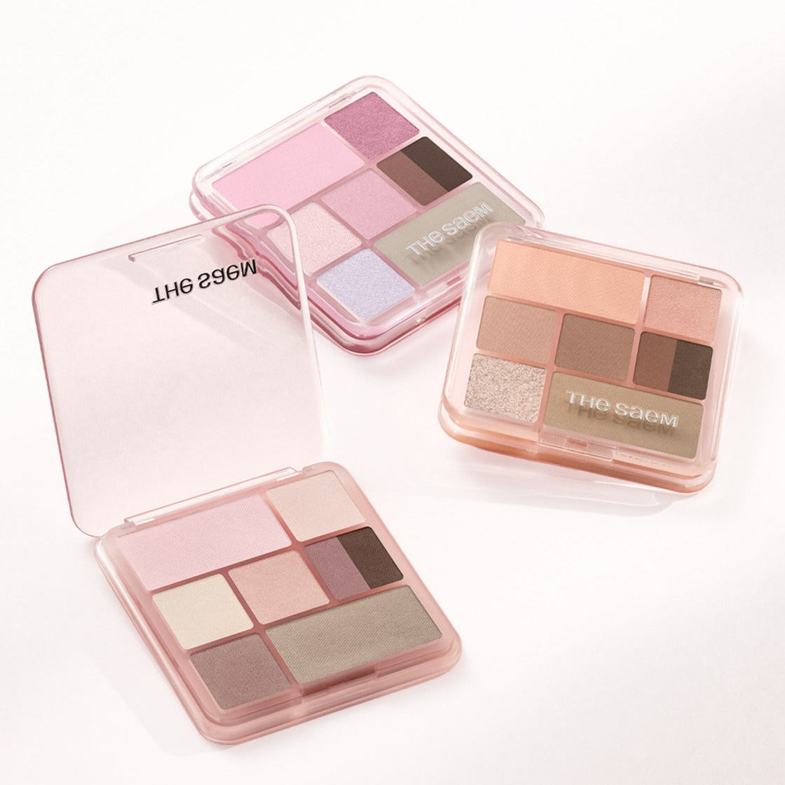 THE SEAM Shadow Box Palette : palette d’ombres dans des boîtiers transparents, teintes nude et rosées, sur fond clair