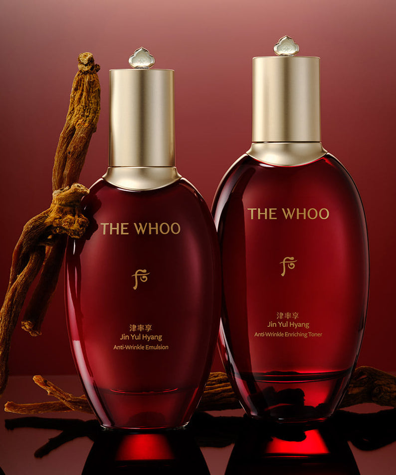 THE WHOO Jin Yul Hyang Anti-Wrinkle Emulsion 110ml flacon sur fond rouge avec détails dorés, soin anti-âge luxueux.