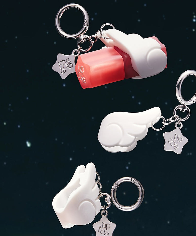TIP TOE Blurrette Sorbet Tint en visuel sur fond étoilé : gants/forme sorbet rose et blanc, porte-clés maquillage.