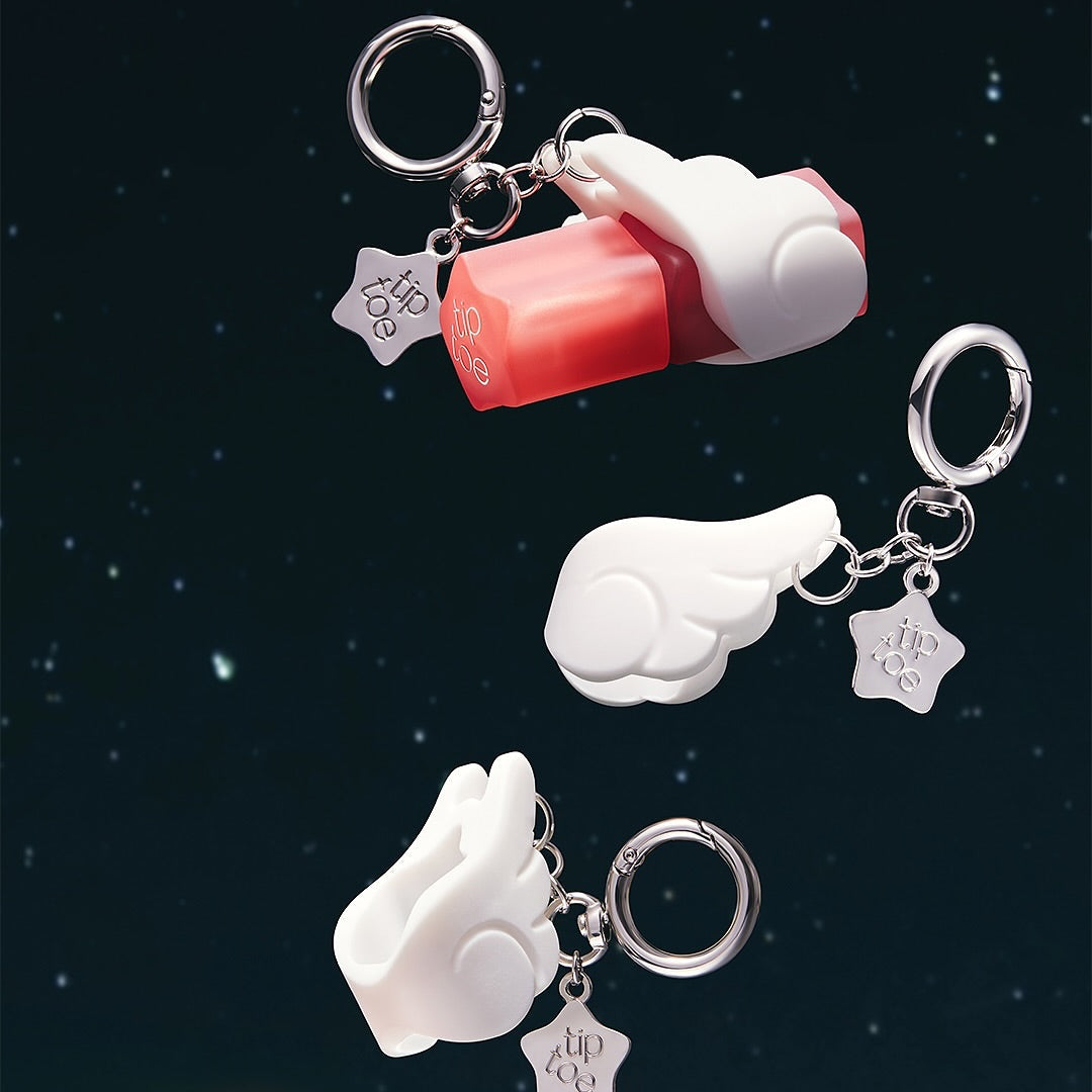 TIP TOE Blurrette Sorbet Tint en visuel sur fond étoilé : gants/forme sorbet rose et blanc, porte-clés maquillage.