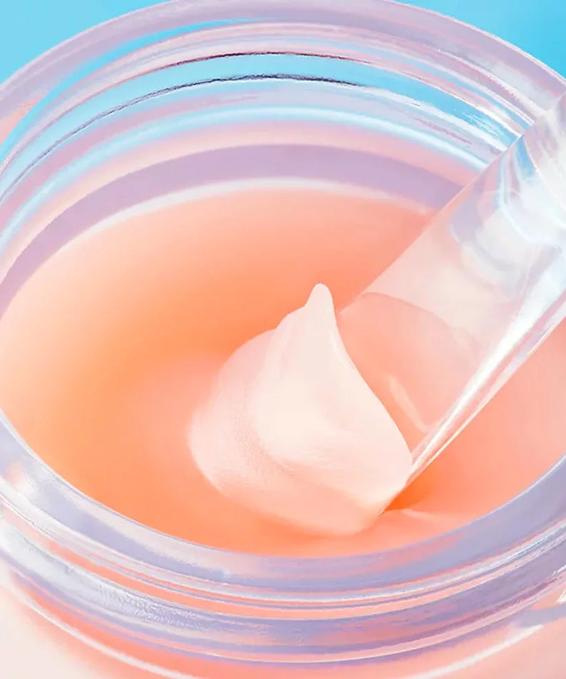 TOCOBO Vita Glazed Lip Mask 20ml : masque à lèvres TOCOBO dans un pot, texture gel rose lumineuse sur fond bleu.