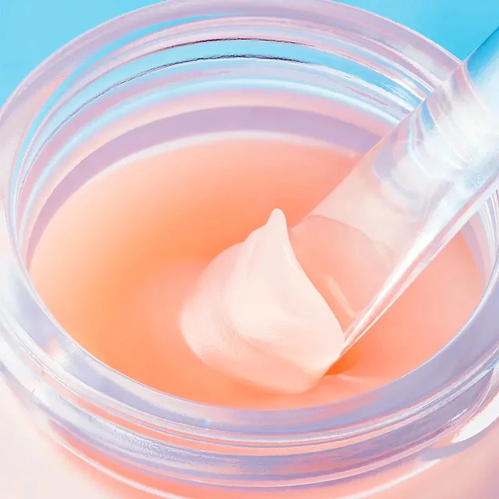 TOCOBO Vita Glazed Lip Mask 20ml : masque à lèvres TOCOBO dans un pot, texture gel rose lumineuse sur fond bleu.