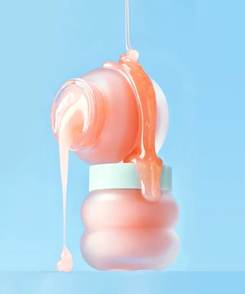 TOCOBO Vita Glazed Lip Mask 20ml, pot de gloss rosé sur fond bleu, texture brillante, contexte beauté