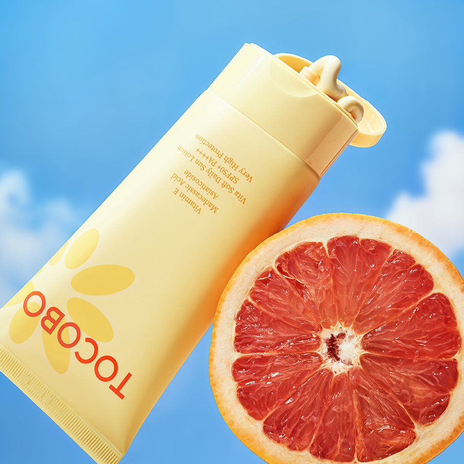 TOCOBO Vita Soft Daily Sun Lotion SPF50+ PA++++ 150ml, flacon crème solaire avec pamplemousse et ciel bleu