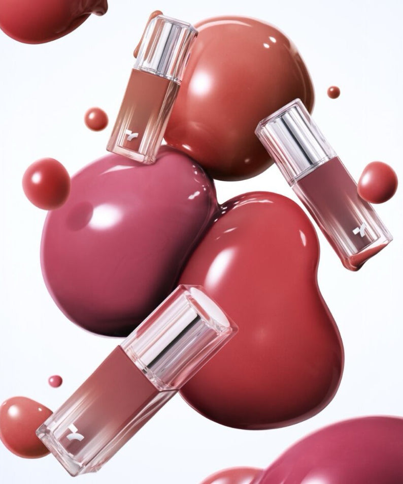 TONY MOLY Get It Tint Waterful Syrup, flacons roses en forme de gouttes, style cosmétique, marque en contexte visuel.