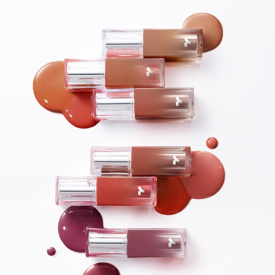 TONY MOLY Get It Tint Waterful Syrup, tubes transparents et teintes dégradées sur fond blanc, marque TONY MOLY