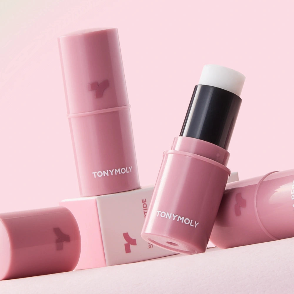 TONY MOLY Shea Peptide Lip Balm de la marque TONY MOLY, baume lèvres rose sur fond pastel (packshot)
