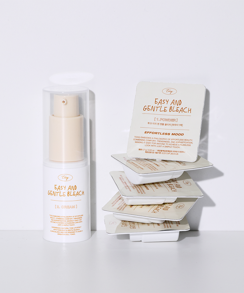 TOOQ Easy And Gentle Bleach de la marque TOOQ : flacon et boîtes, fond blanc, visuel produit en studio.