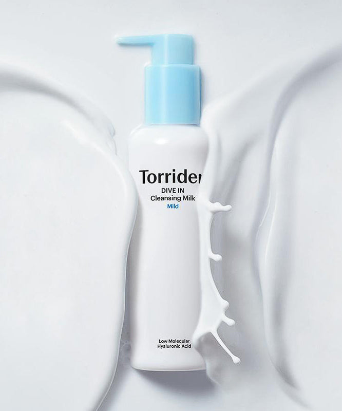 TORRIDEN Divein Low Molecular Hyaluronic Acid Cleansing Milk 200ml, bouteille Torriden sur fond blanc, crème laiteuse.