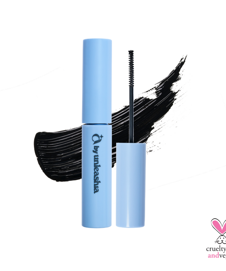 Décris l'image en français : UNLEASHIA Lift Lock Fixing Mascara 3.7g de la marque, cils noirs sur fond clair.