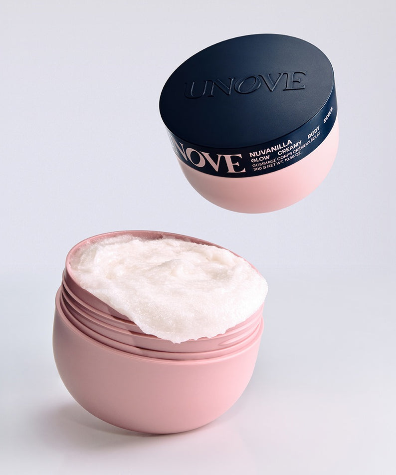 UNOVE Anove Glow Creamy Body Scrub 300g : pot rose crème exfoliante, texture blanche, fond clair, marque UNOVE en visuel