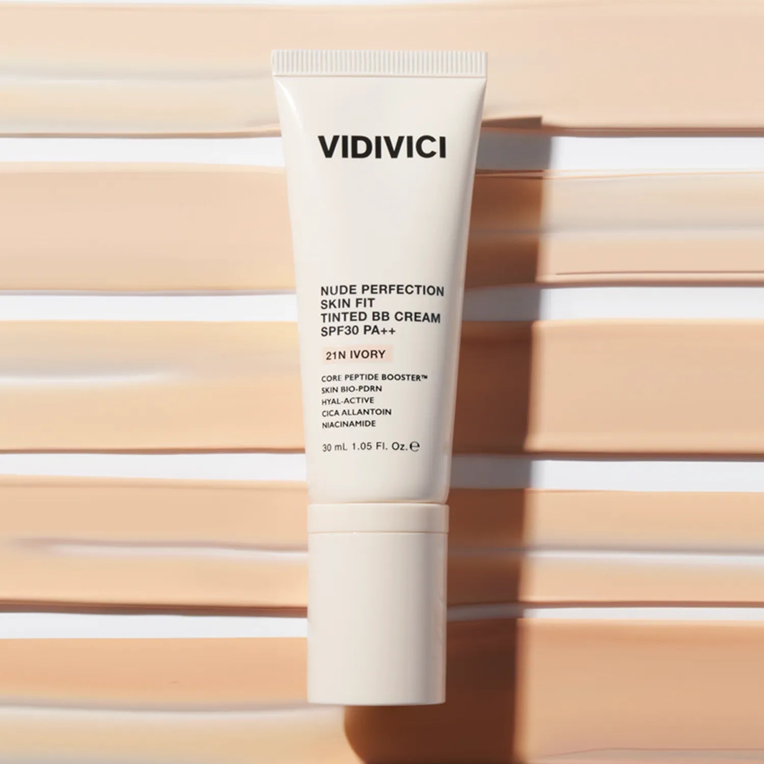 VIDIVICI Nude Perfection Skin Fit Tinted BB Cream SPF30 PA++ 30ml de la marque VIDIVICI, tube sur fond bois rayé.