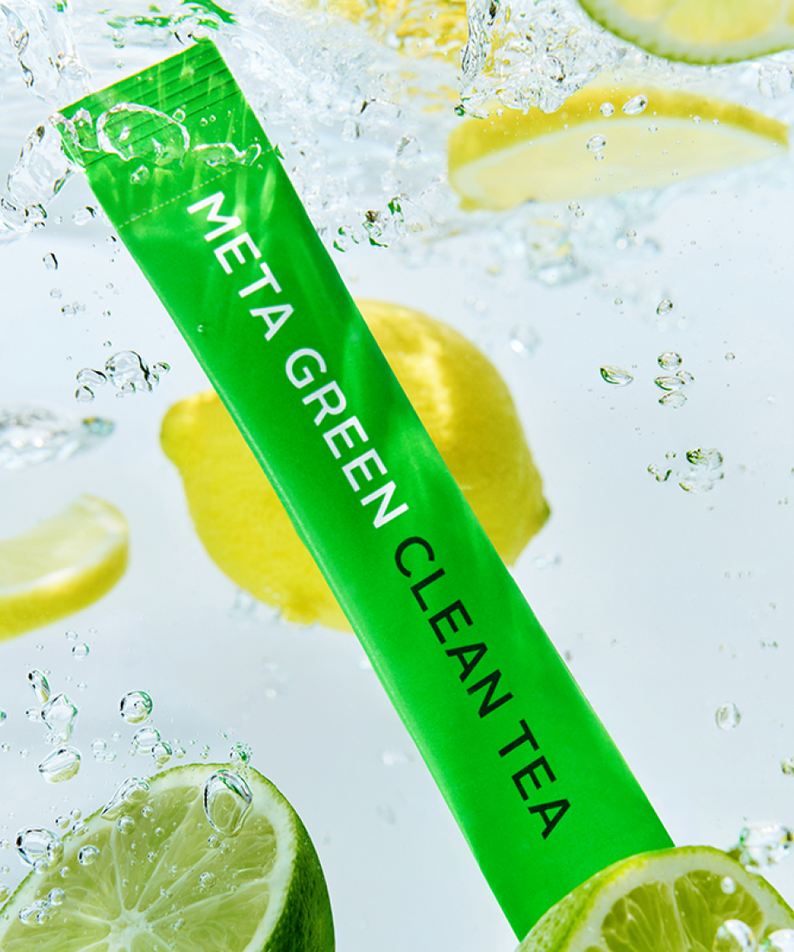 VITAL BEAUTIE Meta Green Clean Tea 10 Packets, sachet vert, fond eau éclaboussures et citrons, visuel rafraîchissant