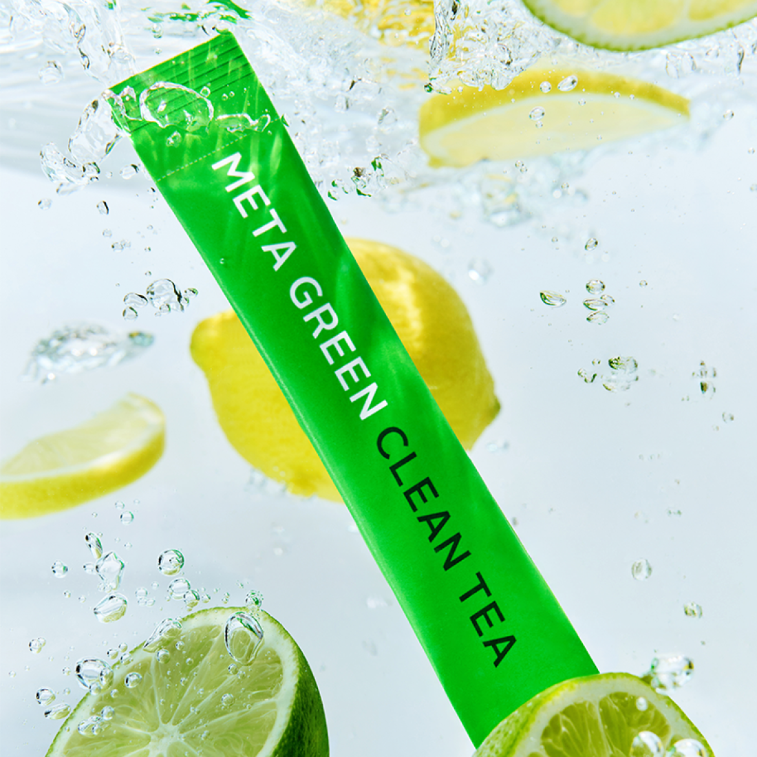 VITAL BEAUTIE Meta Green Clean Tea 10 Packets, sachet vert, fond eau éclaboussures et citrons, visuel rafraîchissant