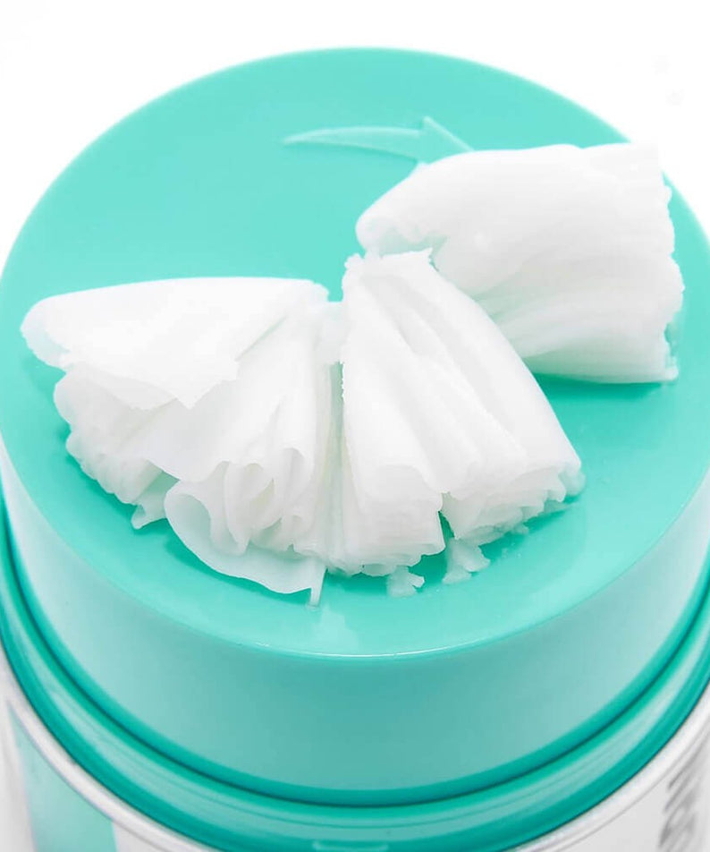 VT COSMETICS PDRN Grinding Cleansing Balm 50ml de VT COSMETICS, baume nettoyant sur couvercle turquoise, texture crème blanche.