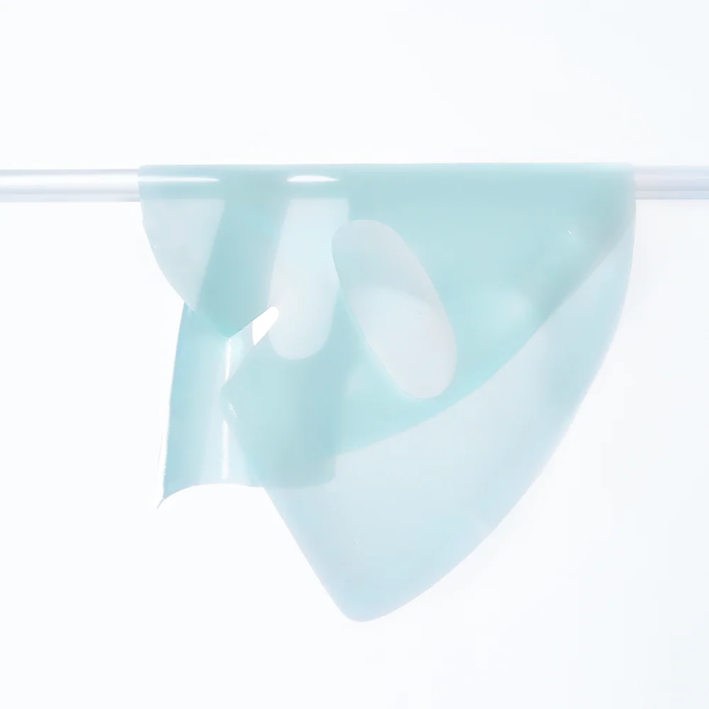 Décris l’image en français : VT COSMETICS PDRN Hydrogel Mask 4 Pack de VT COSMETICS, masque hydrogel bleu sur fond clair.