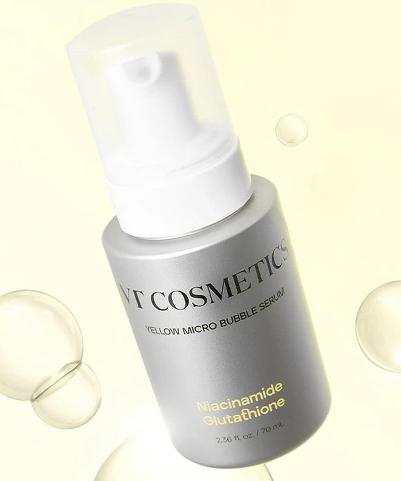 VT COSMETIC Niacinamide Glutathione Yellow Microbubble Serum 70ml en bouteille argentée et bulles en fond jaune.
