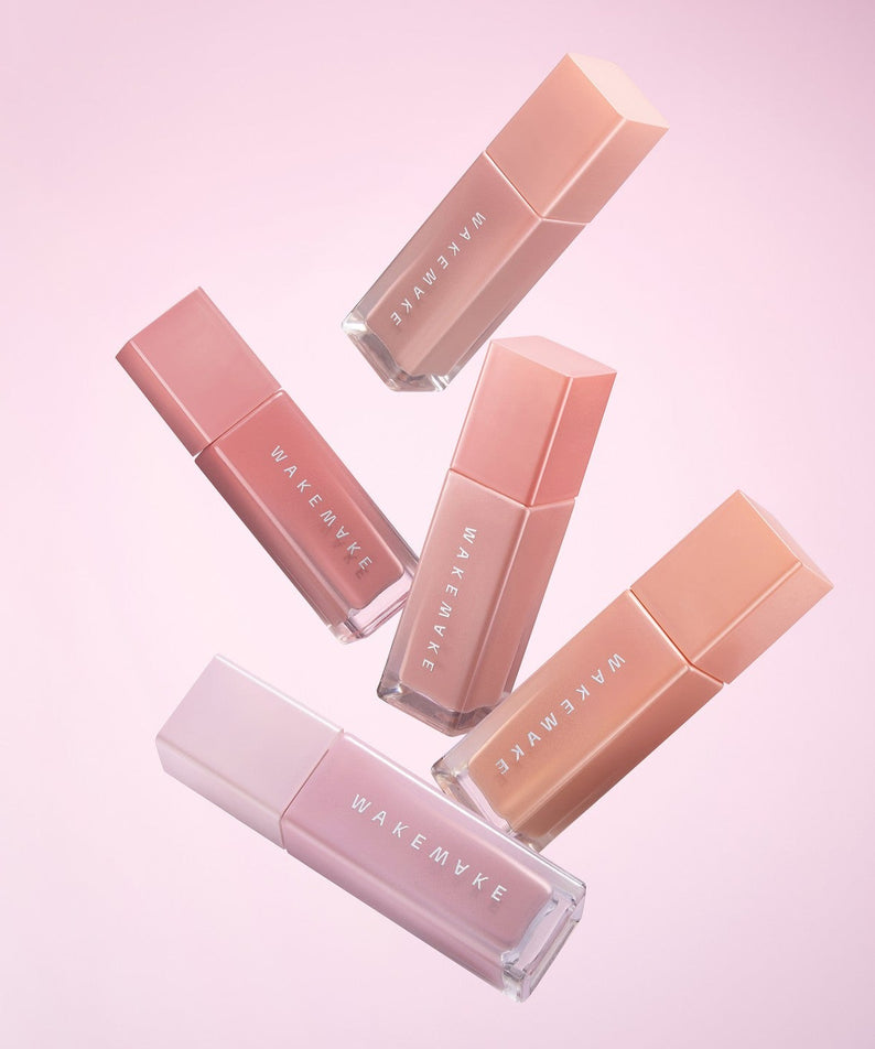 Collection de WAKE MAKE Sheer Glow Liquid Blusher 7g en nuances pastel sur fond rose.
