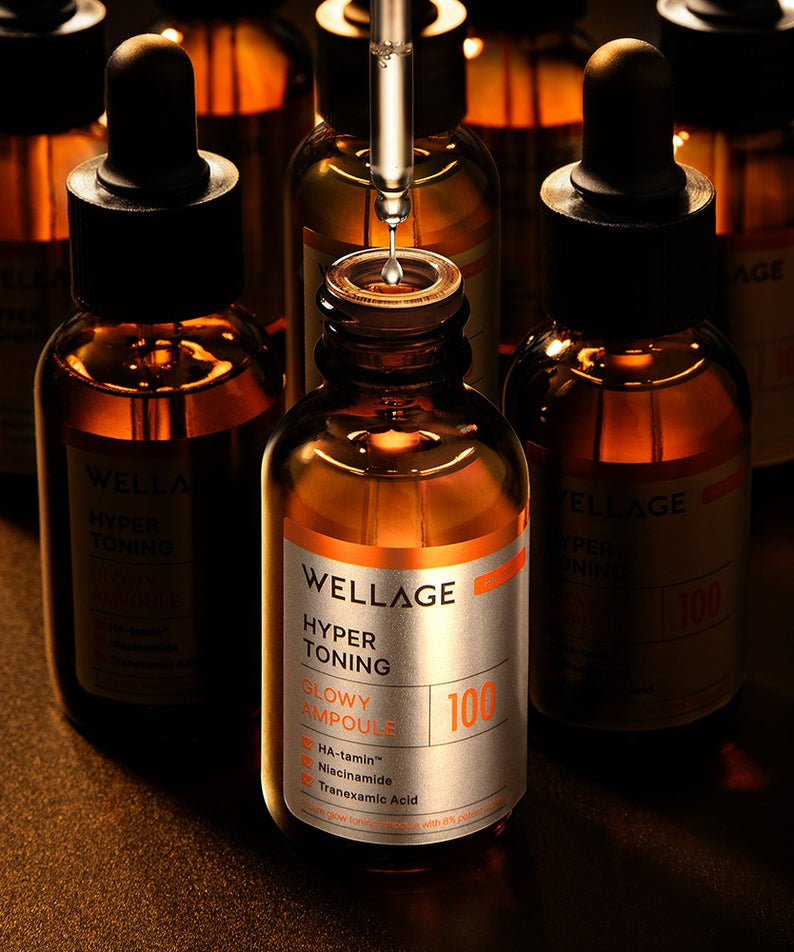 WELLAGE Hyper Toning Glow Ampoule 30ml, marque WELLAGE, sérums ambrés sur fond studio éclairé