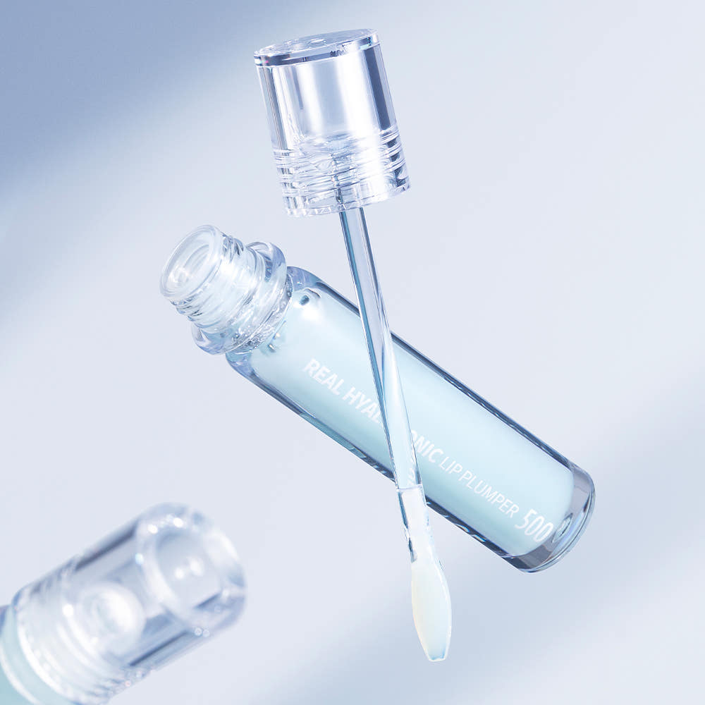 WELLAGE  Real Hyaluronic Lip Plumper 3.8ml, flacon transparent sur fond bleu, gouttes et applicateur pour lèvres pulpeuses.